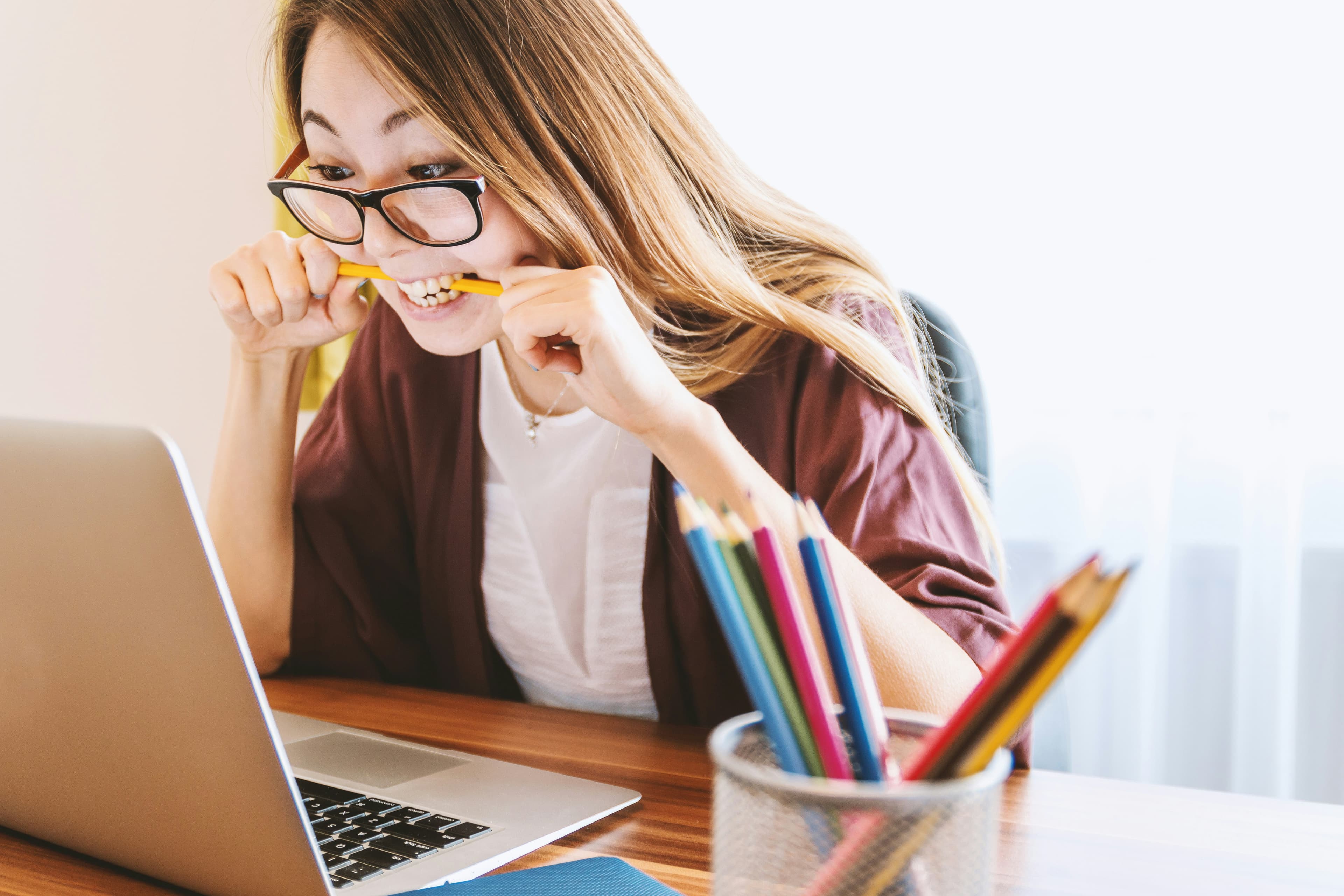 Confused person looking at websites, representing what makes a good website